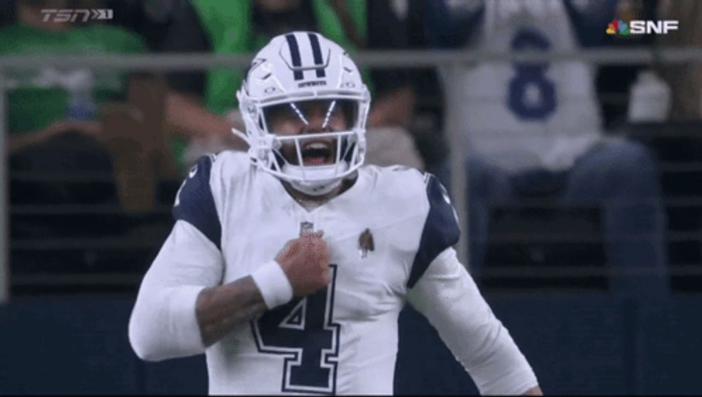 a football player wearing a helmet with the number 4 on his chest