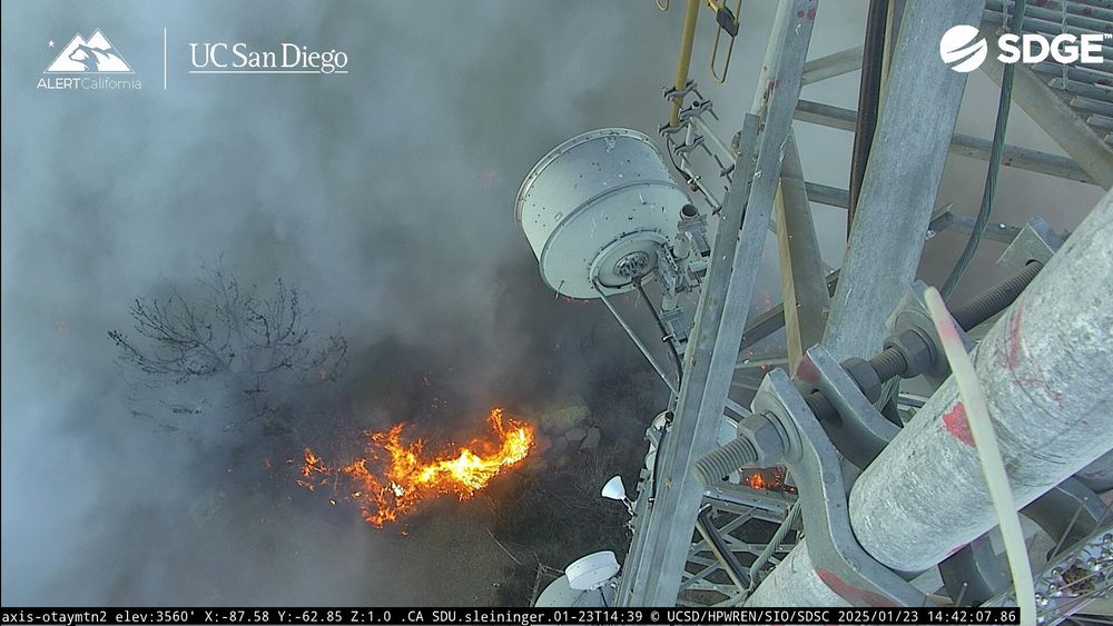 Flames approaching a tower.
