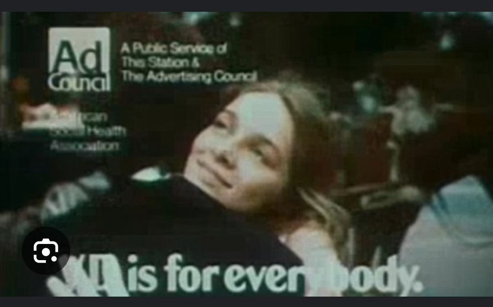 Screenshot from an ad that ran in the 70s talking about how VD is easily transmissible. The picture shows a woman and a man hugging affection. Valley with the “VD is for everybody” text