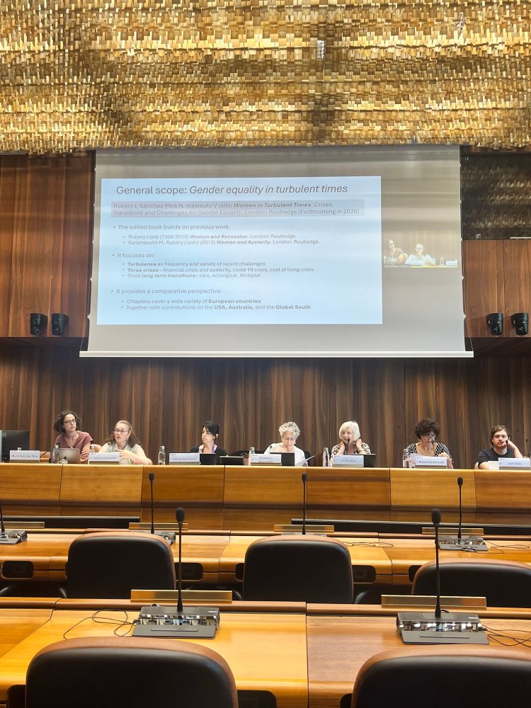 A panel presenting to a room
