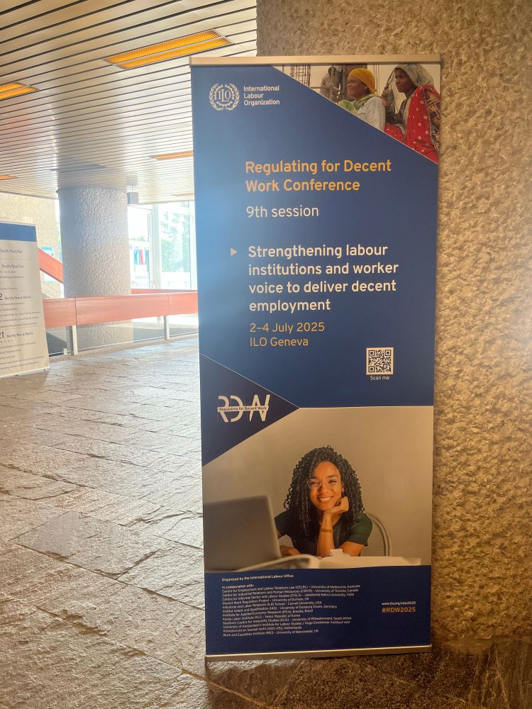 A poster with a blue background and white and yellow writing advertising a conference 