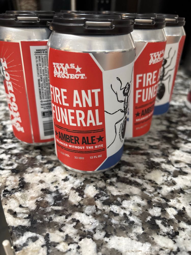 A six pack of “Fire Ant Funeral” beer. 