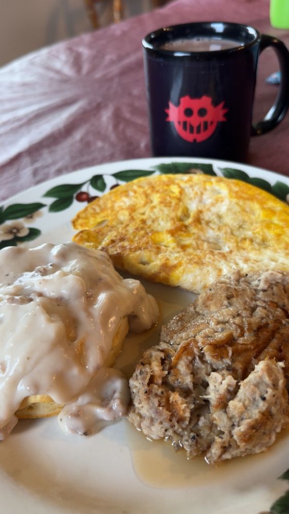 A breakfast I made awhile back, consisting of Grits, Eggs, Biscuit and gravy. And some chocolate milk. Idk I just like to cook and ran out of space to mention it. 