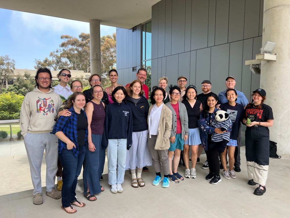 Photograph of the eighteen Clarion Writers’ Workshop graduates with their instructors, Jedediah Berry and GennaRose Nethercott.