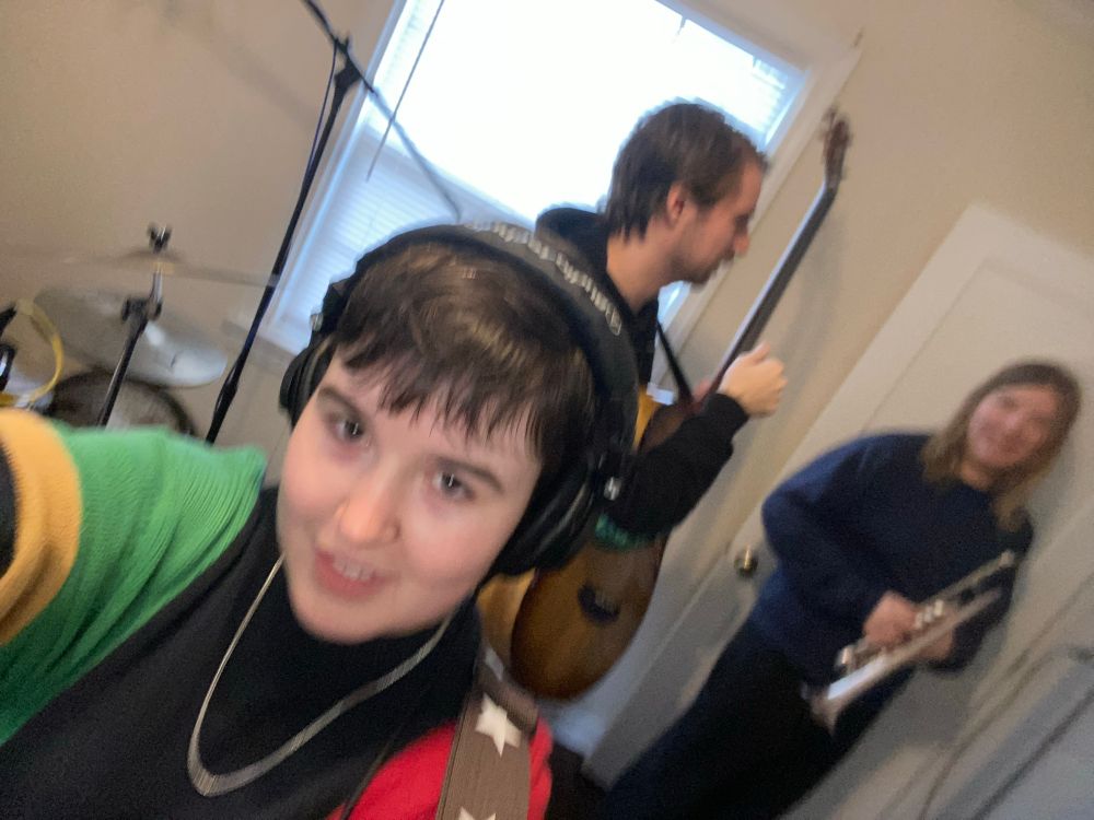 Skyler (looking dumb) and Lyle ring (bass, left) and Justine Sheehan (trumpet, right) (looking cute)