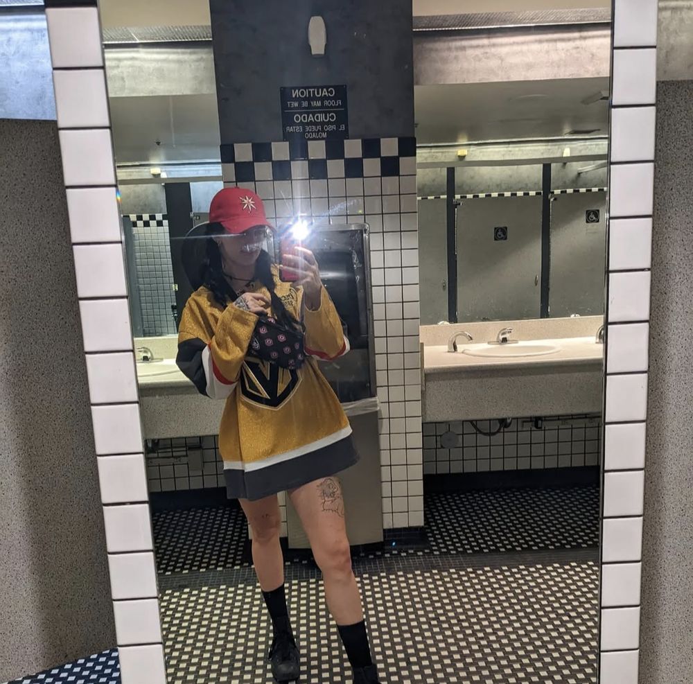 Bathroom selfie of AnarchoCummunist decked out in Vegas Golden knights apparel.
