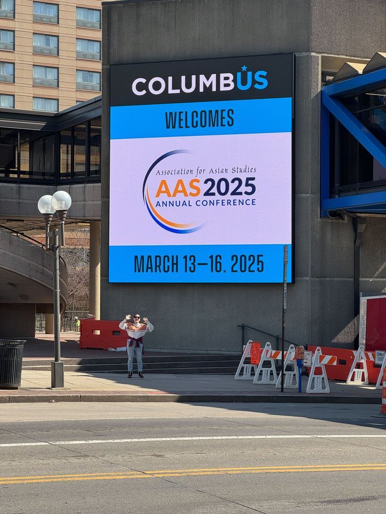 A video signboard reads "Columbus Welcomes AAS 2025 Annual Conference, March 13-16, 2025"