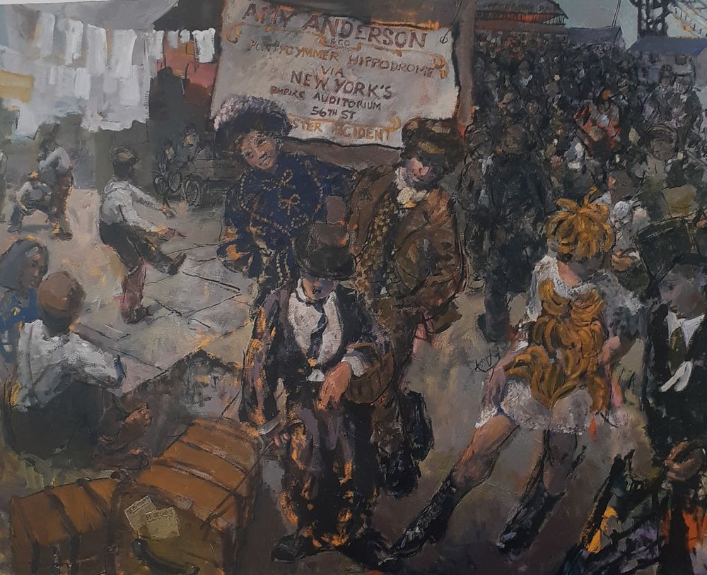 Details of a poster print of figures in the street awhinappear to be from a circus troop just arrived in a village. There are trunks in the foreground and a pot head in the background.