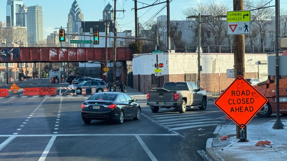 We’re deep in Eagles territory, afraid for our lives. Gotta back our truck where the orange truck is in off the street. Thankful for that closed street though.