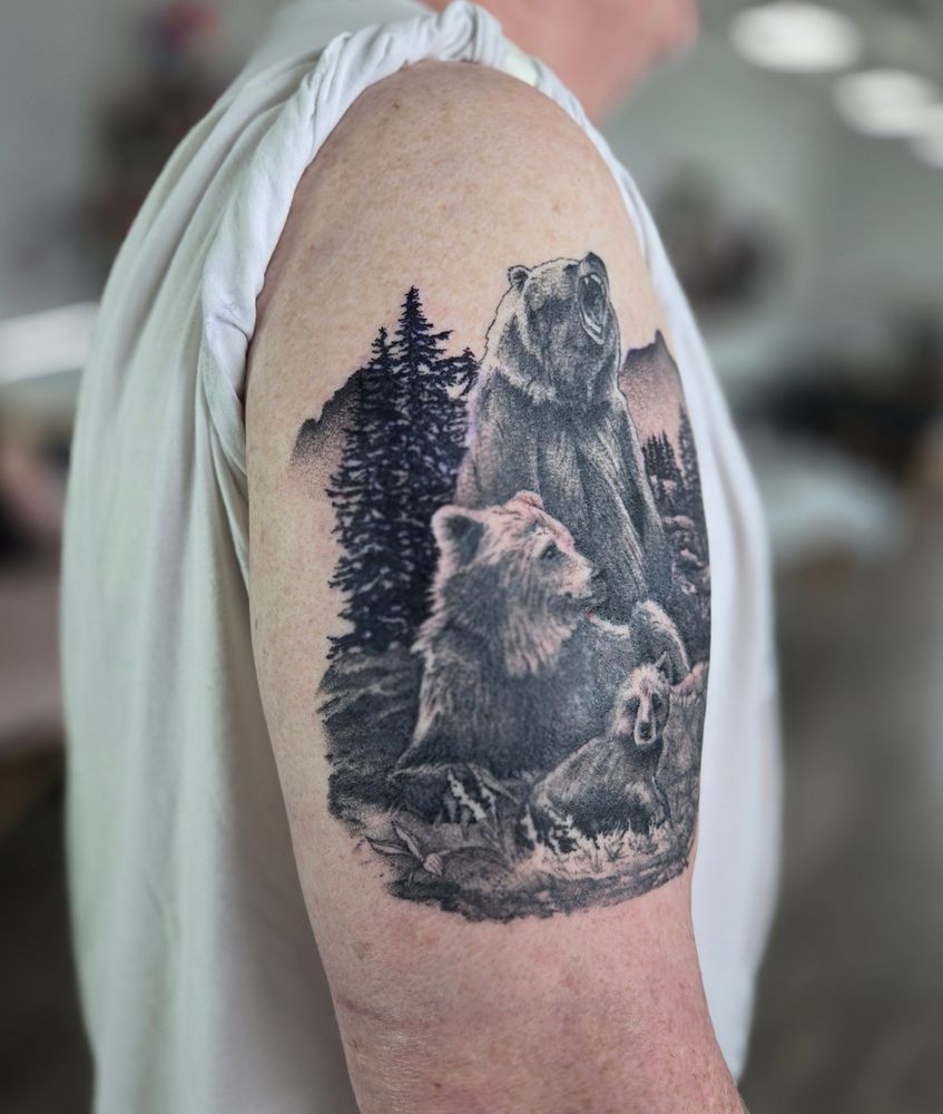 this tattoo is mostly healed, with some new background trees and a mountain