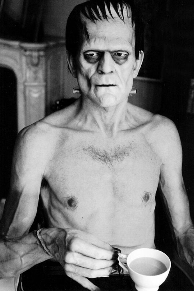 Boris Karloff having a tea break on the set of Frankenstein (1931)
