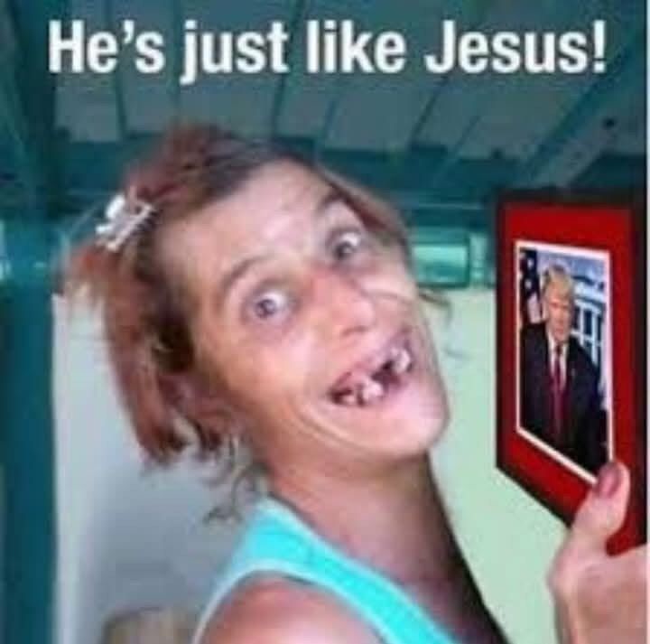 A humorous photo of a woman missing a lot of teeth holding a photo of Trump. She is saying “He’s just like Jesus!”
