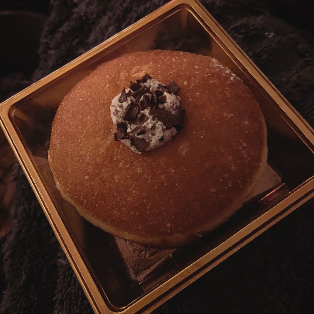 a chocolate cream donut