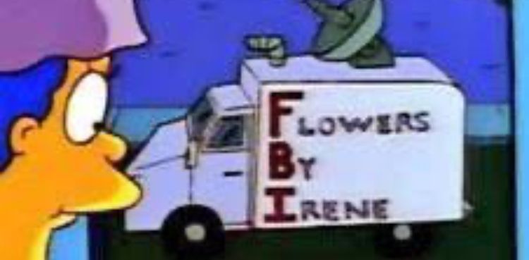 Marge Simpson looking at a poorly disguised FBI surveillance van.