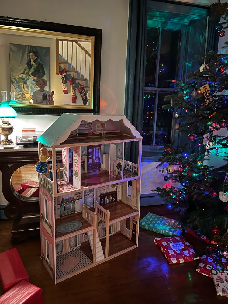 Assembled Kid Kraft dollhouse. Three floors and an attic. Two Barbie’s on the third floor.