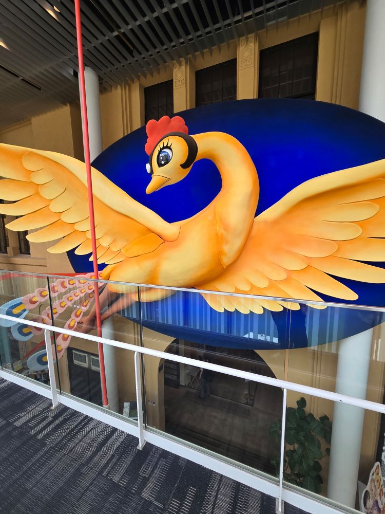 Photo of a sculpture inside the museum depicting Osamu Tezuka's phoenix.