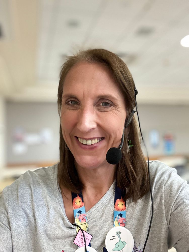Selfie at work as I prepare for a program. I’m wearing a headset microphone.