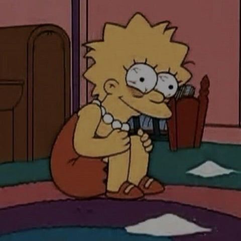 Lisa Simpson sitting, holding her knees and looking either exhausted or high