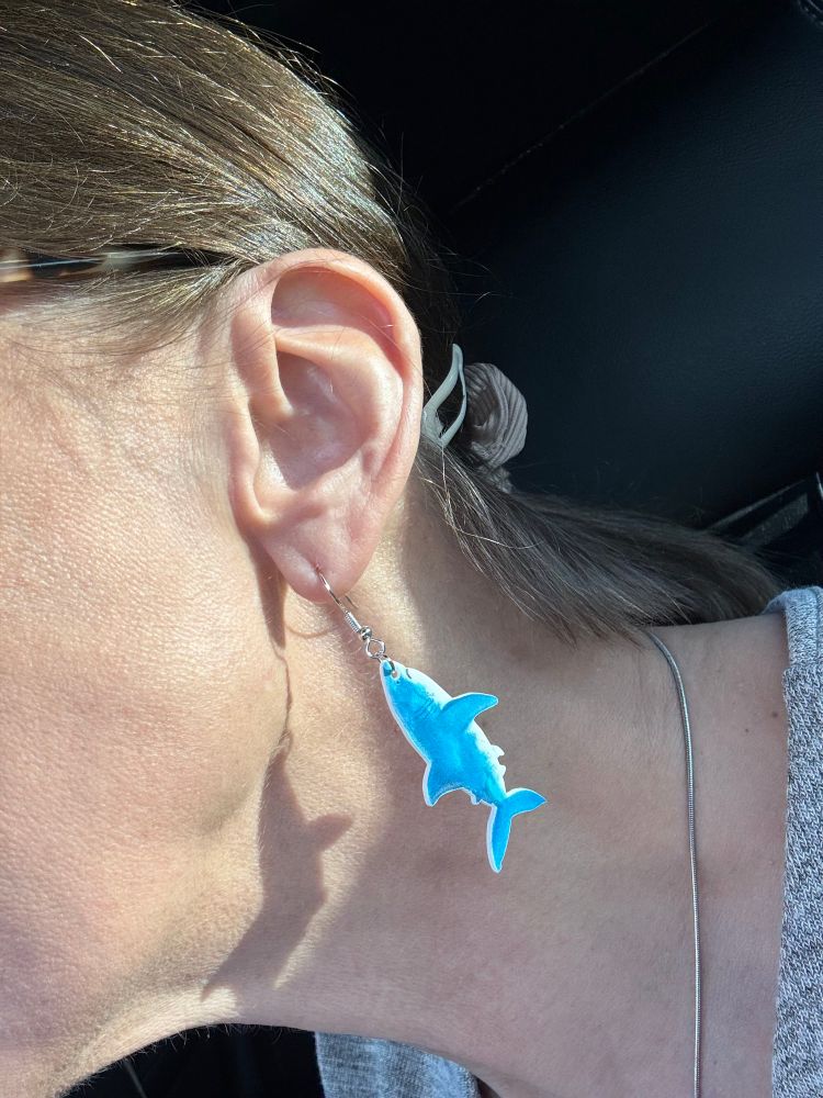 A closeup of my shark earrings. 
