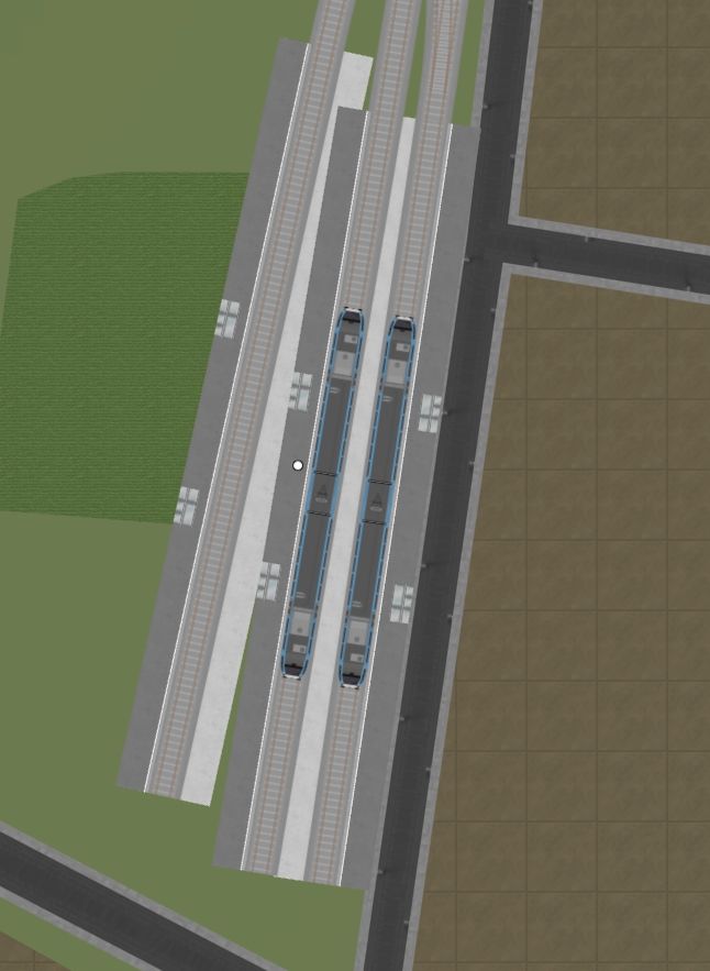 top down view of a small 3 platform branch line terminus, in it 2 Stadler GTWs await departure 