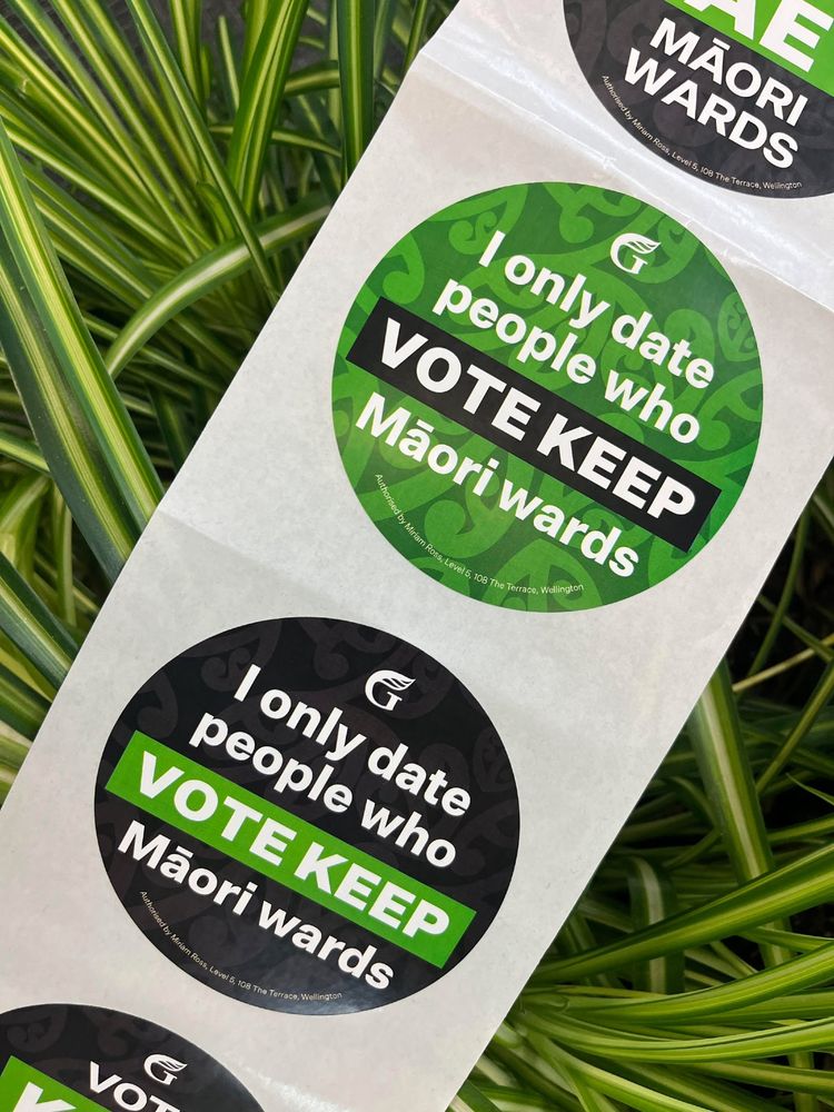 Stickers on a plant background. They say "I only date people who vote keep Māori wards' 