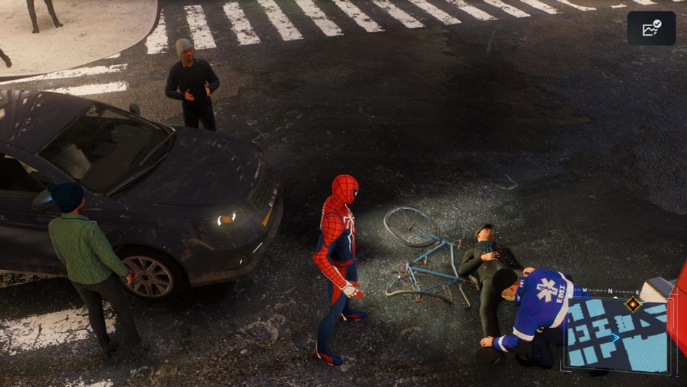 Spider-Man inspecting a bike accident. 