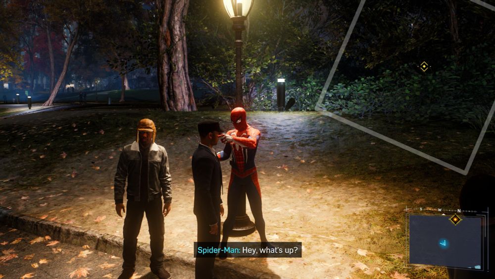 Spider-Man poking a stranger in the face. 