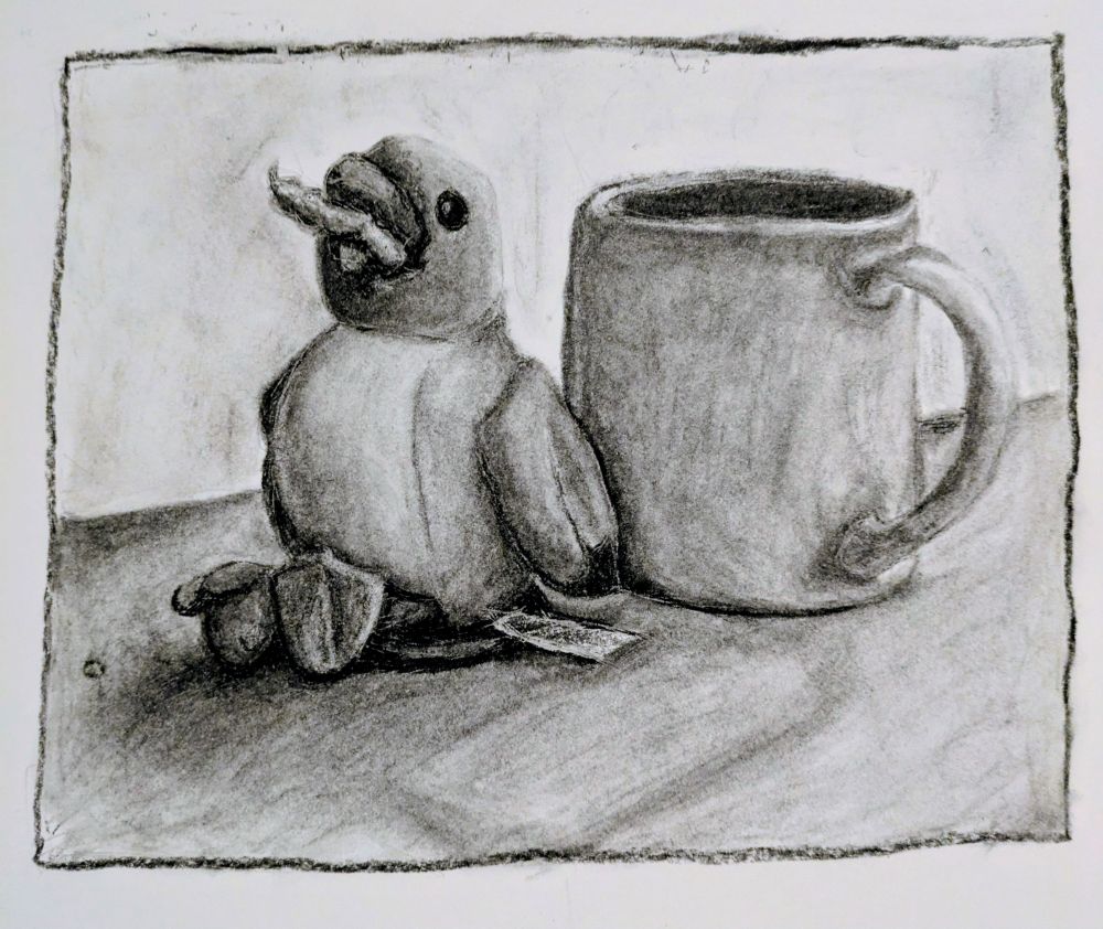 Charcoal drawing of a stuffed seagull sitting beside a coffee mug.