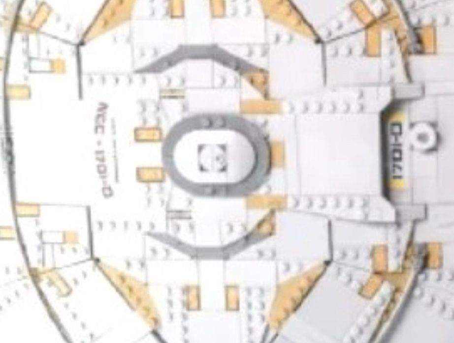 Mirrored close-up of the saucer of a leaked/rumoured Enterprise-D made of legos.