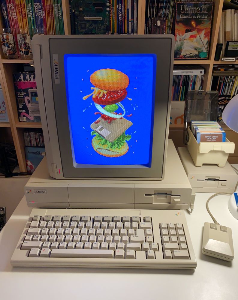 Photo of an Amiga showing Jack Haeger’s “Four-byte Burger” on a CRT. Credit: Blake Patterson, https://www.flickr.com/photos/blakespot/52842777035