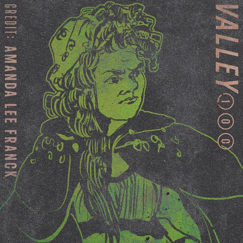 A young-looking person with long hair partially covered by a bonnet and a scowl on their face.

Credit: Amanda Lee Franck