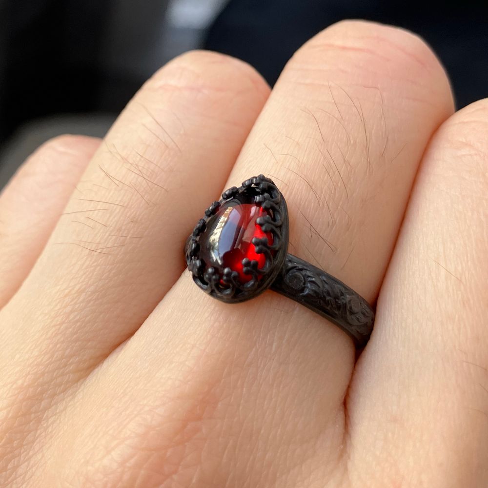 Closeup of the garnet ring. 