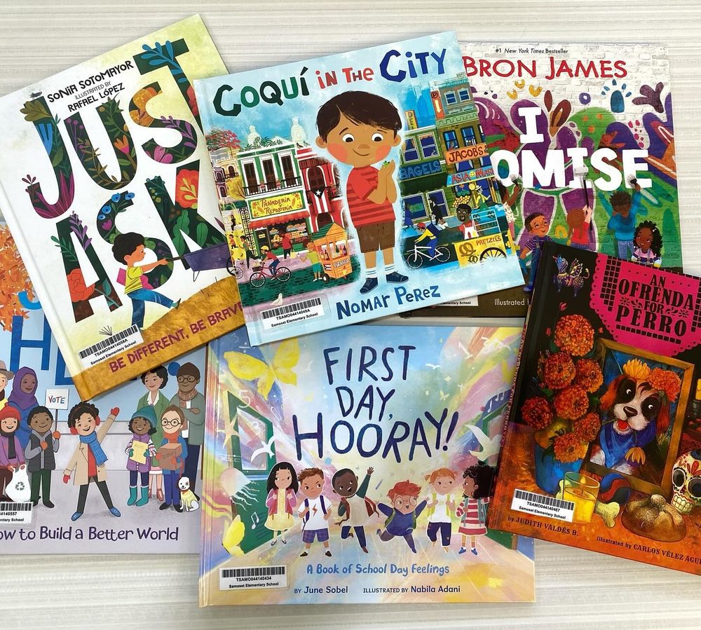 image of children's books neatly arranged on a table