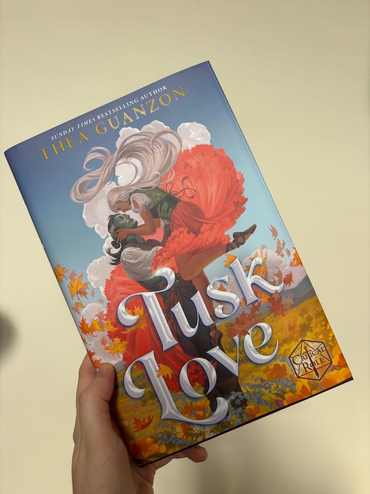 A hardback copy of the book Tusk Love by Thea Guanzon