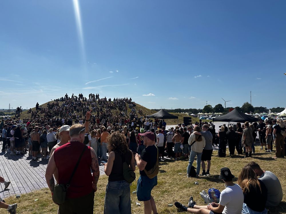 Hundreds of people watching a dance competition at the festival. 
