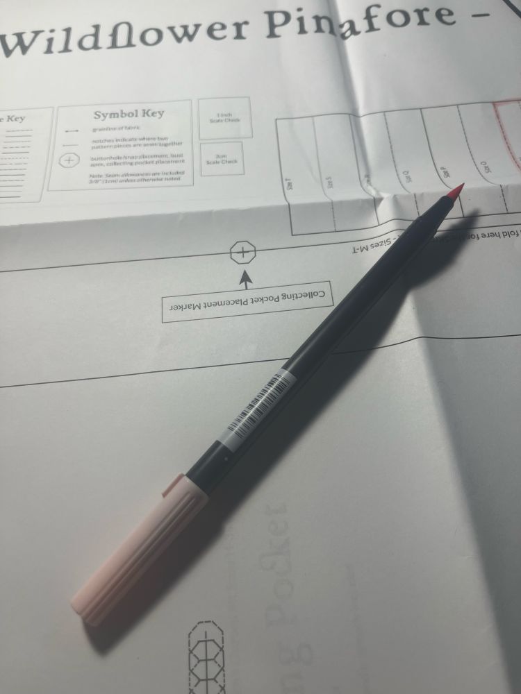 A huge sewing pattern for a pinafore