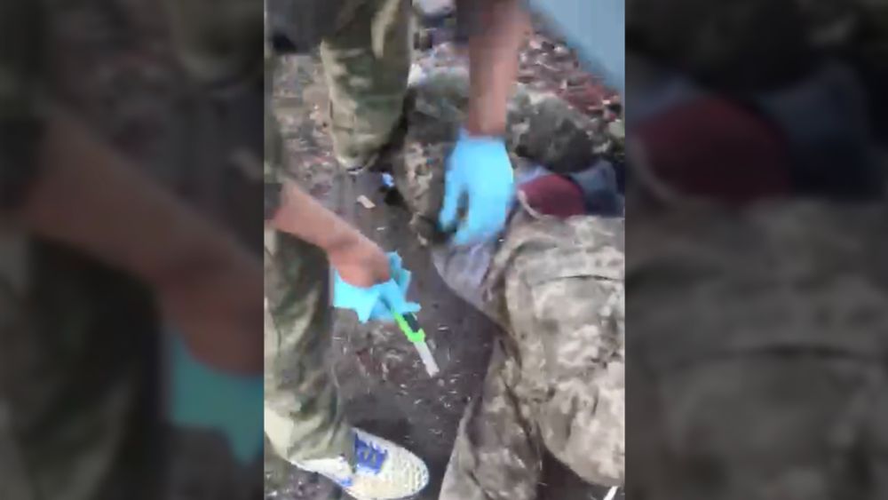 Horrifying footage appears to show Russian captors castrating a Ukrainian prisoner of war