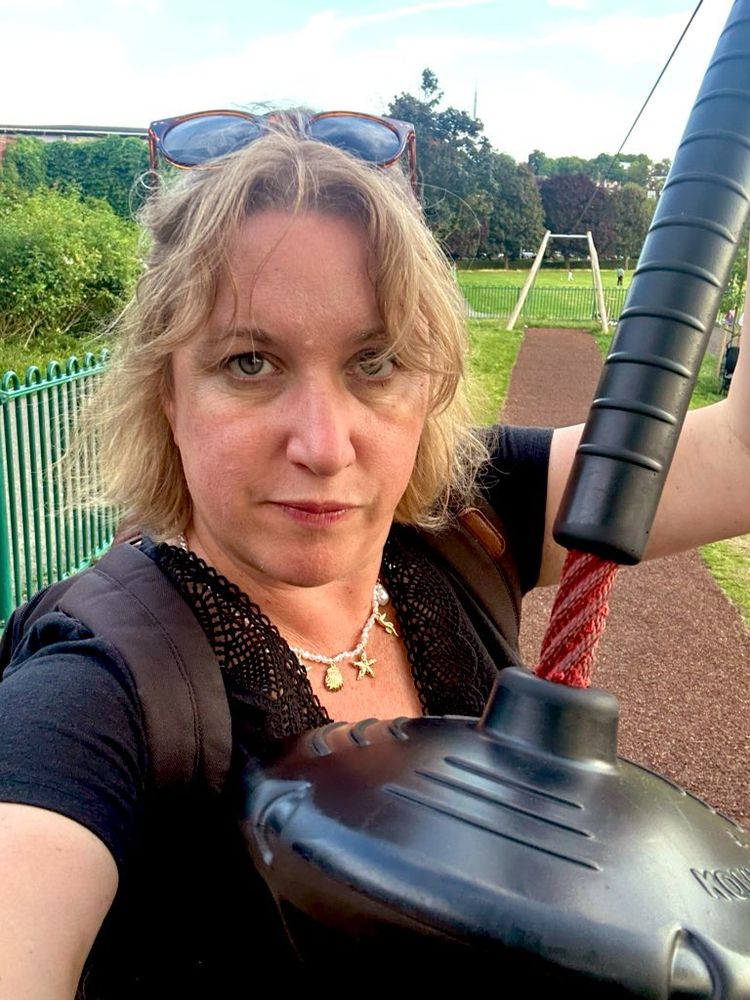 Me holding a zip wire seat thingamybob 