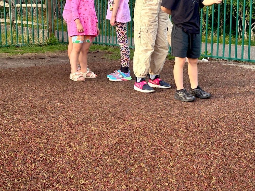 Feet in the queue for the zip wire 