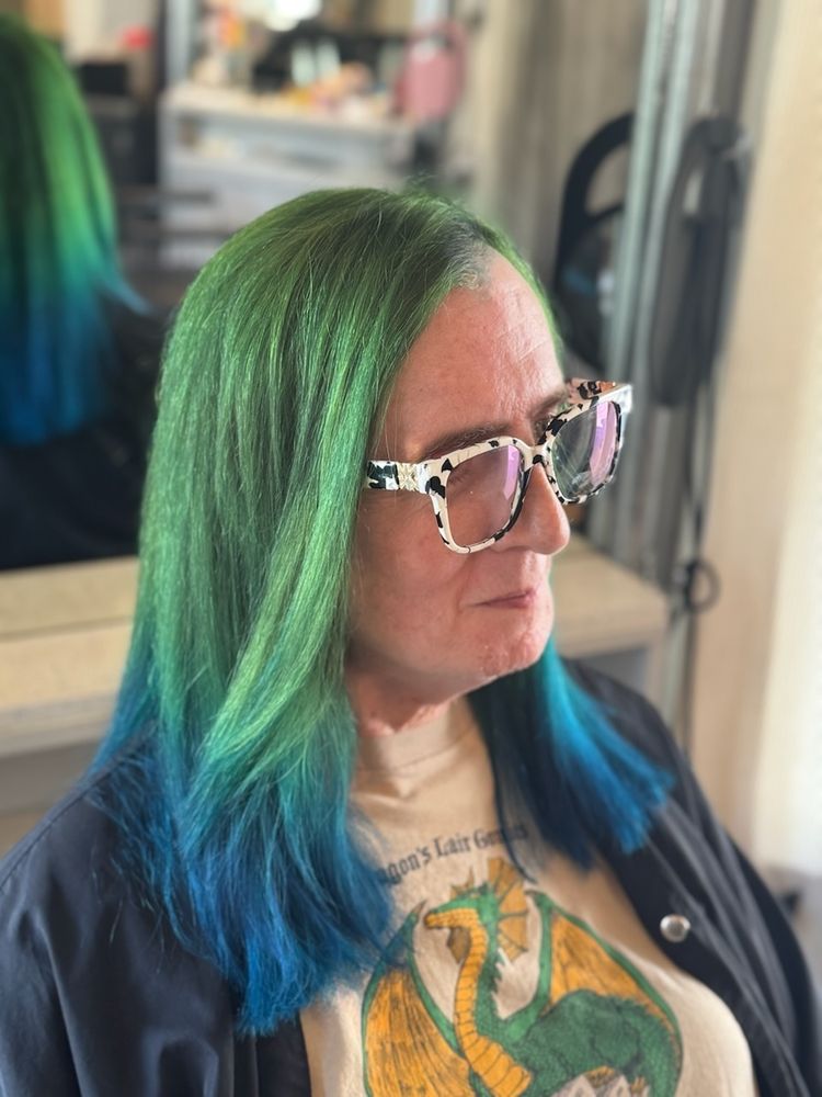 Margo with new green and blue hair. 