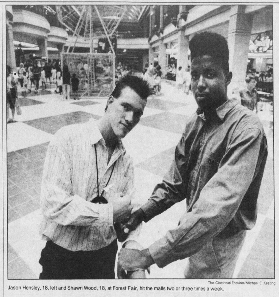 A photo from the Cincinnati Enquirer showing two teens at the mall. Their styles are immaculately late 80s / early 90s.