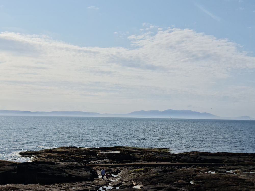 Arran from Troon beach, ferry carrying remarkably accident-prone person with newly acquired moonboot just visible in the distance. 