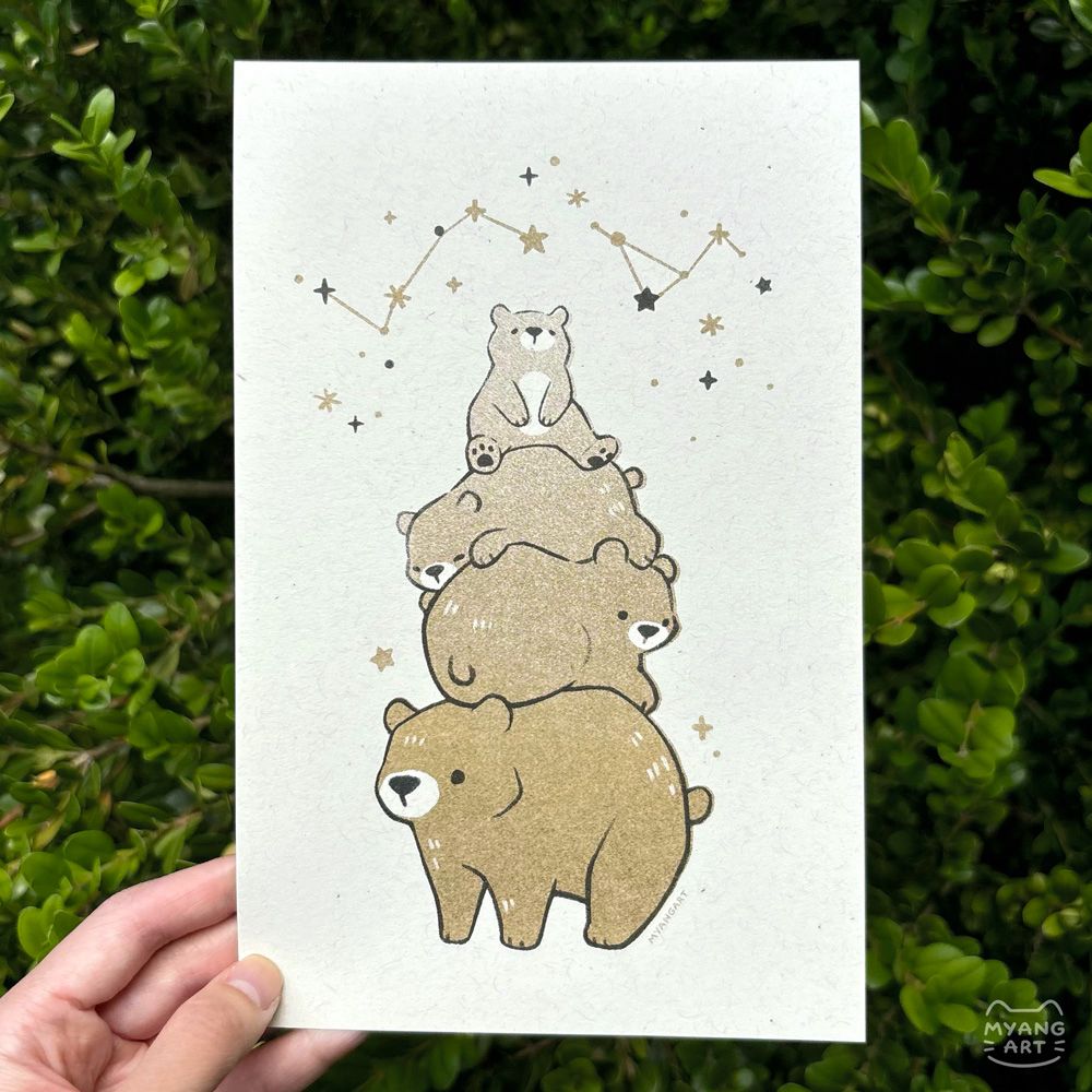 Risograph print drawn in a cute, simple style of four bears stacked on top of each other. The size of the bears gets smaller towards the top of the stack. Above the bears are scattered stars and constellations. The bears and stars lie on the plain color of the paper with no other background. Inks used are black and flat gold. 