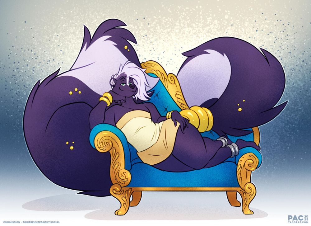 Prince Iris, laying on a too-small divan couch of blue and gold, knowingly grinning at the viewer.  His tail teasingly curls out behind him, filling the volume that the couch takes up behind him more than twice over.