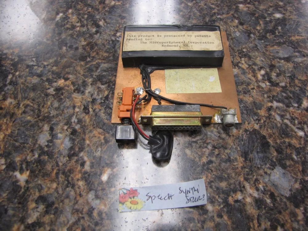 device with sticky note "Speech synthesizer?"