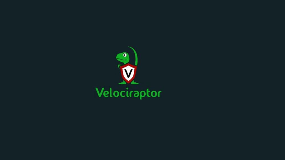 Velociraptor logo showing a green cartoon raptor holding a shield with a “V” symbol.