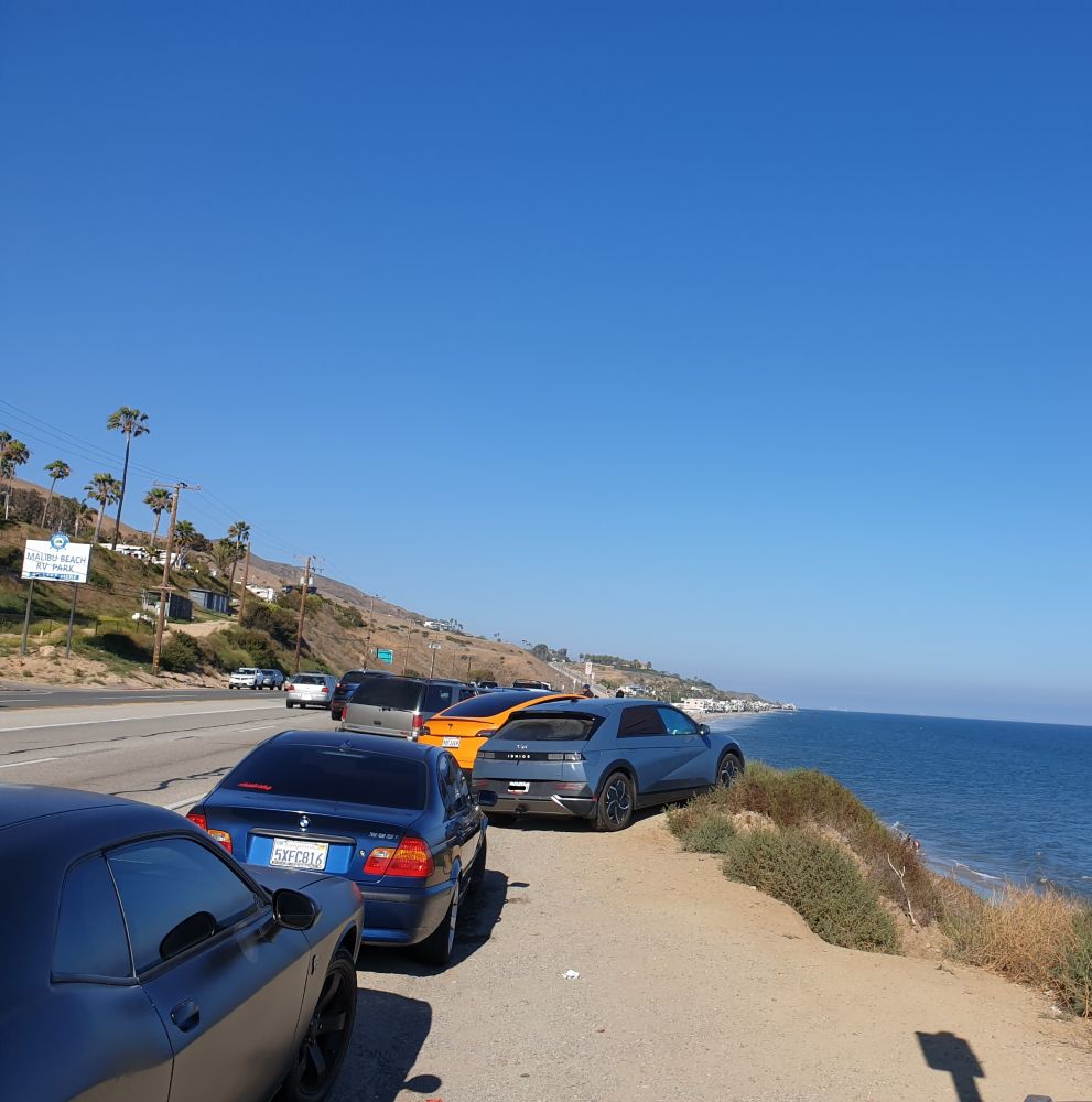 Cars parked near the beach in Malibu. 