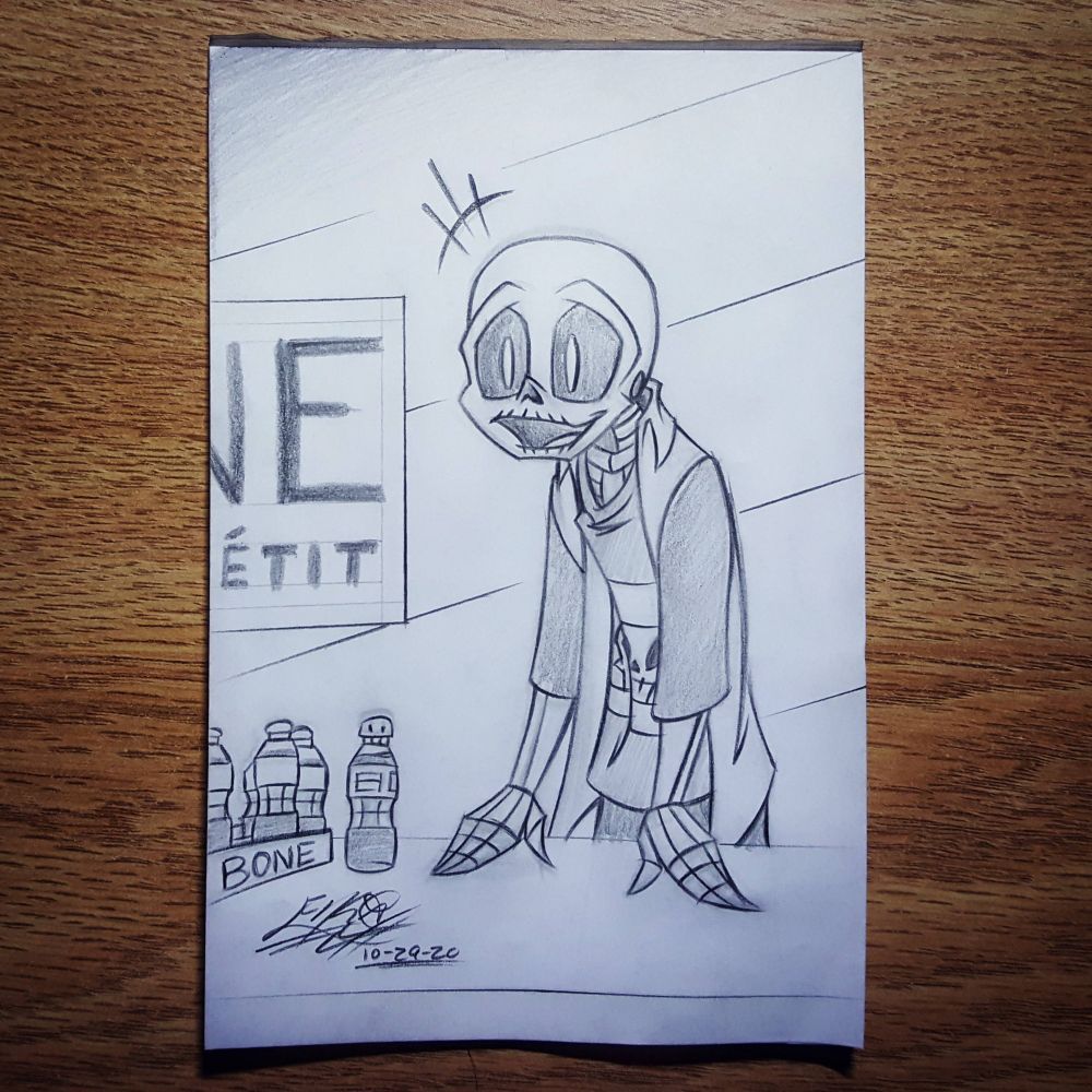 Photo of a pencil pic from Drawlloween 2020. An enthusiastic skeleton stands with his hands on a table pitching his miraculous weight loss supplement, Bone Appétite. A few bottles sit next to him. They look like the little plastic kid's juice bottles with the snap off tops that were popular in the U S in the 90's. 