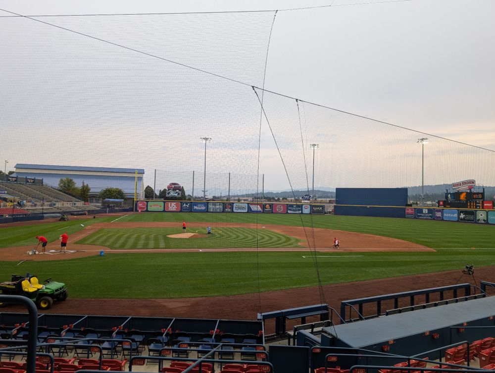 Baseball field. It is cloudy and also smoky.
