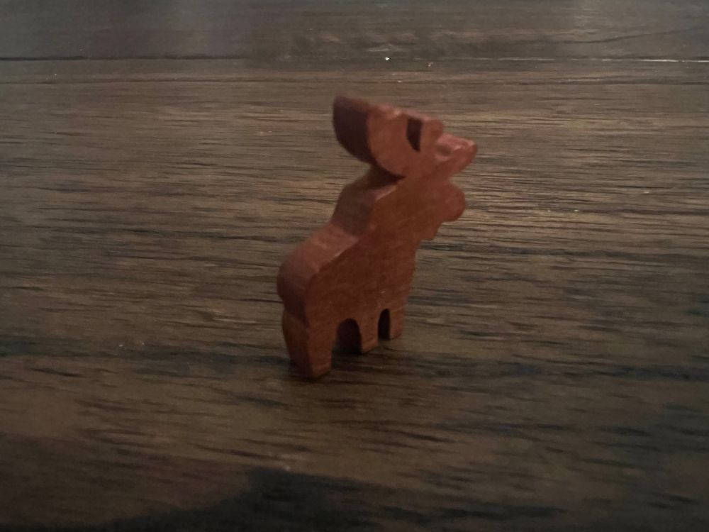 A brown moose figurine from the boardgames PARKS